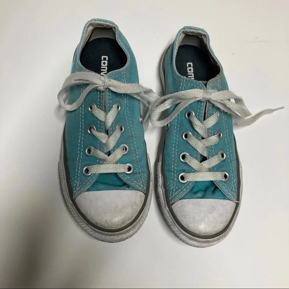 Kids size 13 teal Converse. In play condition